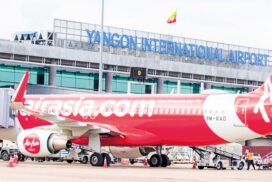 Officials welcome AirAsia (Berhad) flight at Yangon International Airport