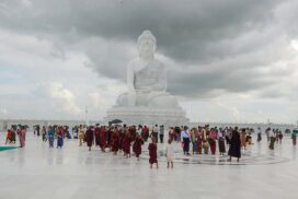 Flocks of pilgrims visit world's tallest sitting marble Buddha image