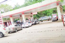 Line-up of cars waiting at filling stations cause heavy traffic jams