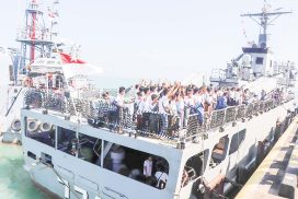 Naval vessels bring Myanmar citizens back from Thailand