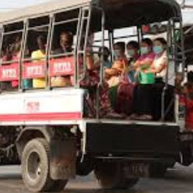 Garment factory workers in Yangon Region seen on a staff ferry bus.
